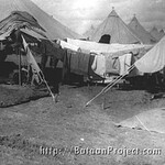 Laundry hangs between tents during maneuvers at Ft. Knox. Sandmire37