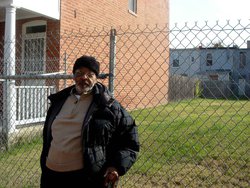 When I took Dunaway back to the corner in 2008, I asked him how far back along the fence in the backyard had the ball landed. He said, "Under the window.