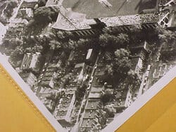 In this later photograph, the houses behind the Fifth Street fence are visible. The house closest to the corner of Fifth and Oakdale has a white roof.