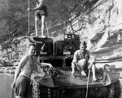 Laprade Brown leans on his tank in the Salt River. Brown Tank Crew