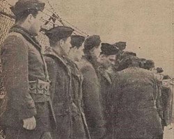 S/Sgt. Edward G. Winger takes roll call of the members of B Company before they leave for Ft. Knox. Lm3