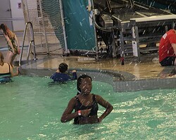 Teens swimming