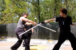 Masteri Gilo and Lorenzo in combat.