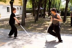 Master Gilo and Lorenzo in combat