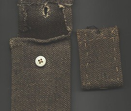 This case and address book were made by Lewis Wallisch while he was a POW in Japan. This case and address book were made by Lewis Wallisch