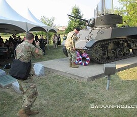 Gen. Richard Hayes Jr., places the wreath that honors the Illinois National Guard members of HQ and B Companies. Gen. Richard Hayes Jr., places a wreath