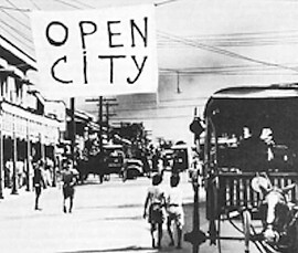 Japanese troops entering Manila.
U. S. National Archives Japanese troops entering Manila.