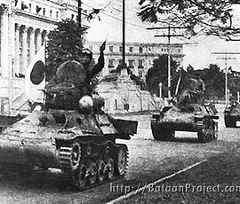 In this photo from the National Archives, Japanese tanks enter Manila.
U. S. National Archives Japanese tanks enter Manila