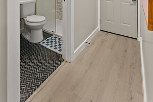 Bright and clean bathroom featuring a walk-in shower and tasteful decor.