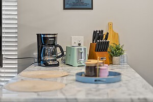 Comfortable kitchen with coffee essentials and decorative accents.