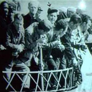 An arrow points to Pfc. Earl Fowler as he and other liberated POWs celebrate their return to the United States.
Courtesy of the Fowler Family Fowler On Homebound Ship