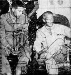 In this picture, 1st Lt. William Gentry and Brig. Gen. James N. R. Weaver answer questions asked by the families of D Company, 192nd Tank Battalion. Weaver/Gentry