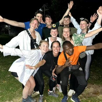 Photo group friends outdoors night headlamps 2026 05