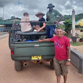 Tourists riding in pickup truck sri lanka