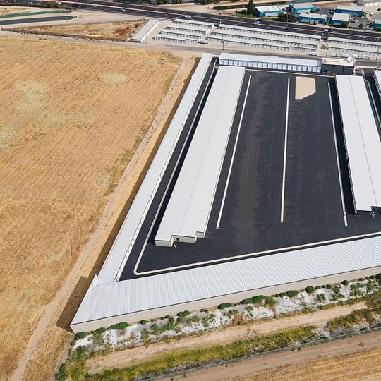 Secure outdoor RV and boat storage in Modesto, California, providing spacious and convenient parking for your vehicles.