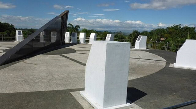The memorial is a sundial showing the time of liberation by U.S. Rangers Memorial Sundial
