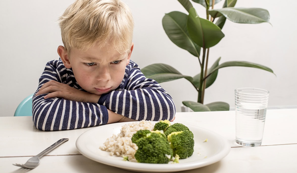 Boy Does Not Want To Eat His Veggies