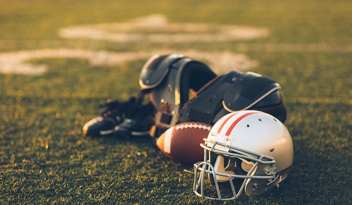 Silver Football Helmet On Field