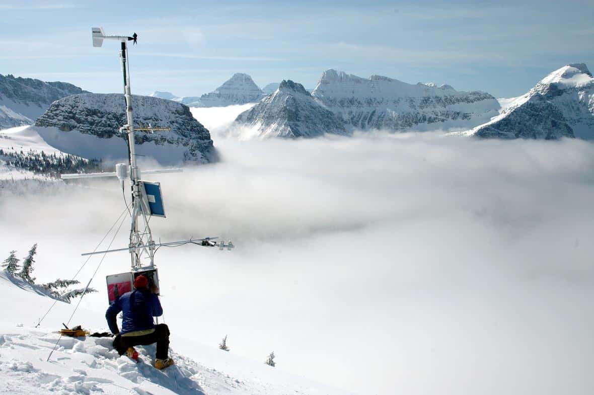 A weather station adjacent to the Haystack Creek avalanche path in Glacier National Park. Weather stations are used to measure wind speed and direction, air temperature, relative humidity, and net radiation measurements. Photo: Suzanna Soileau, USGS. Public domain