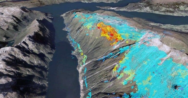 InSAR data for Osmundneset. Blue are areas with no movement, yellow and red points are areas that are moving about 0.5 cm/year. Source: Geological Survey of Norway.