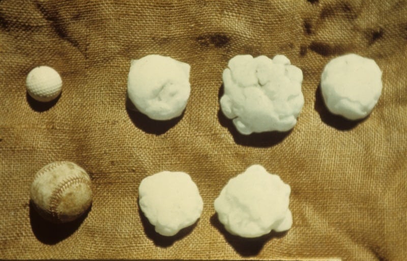 Photo showing golf ball and baseball sized hail.