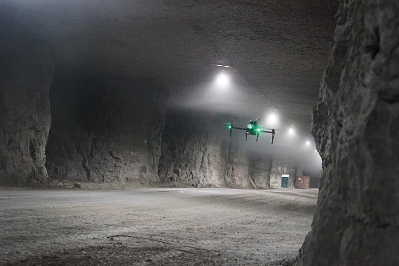 Image of an autonomous drone flying in a tunnel.