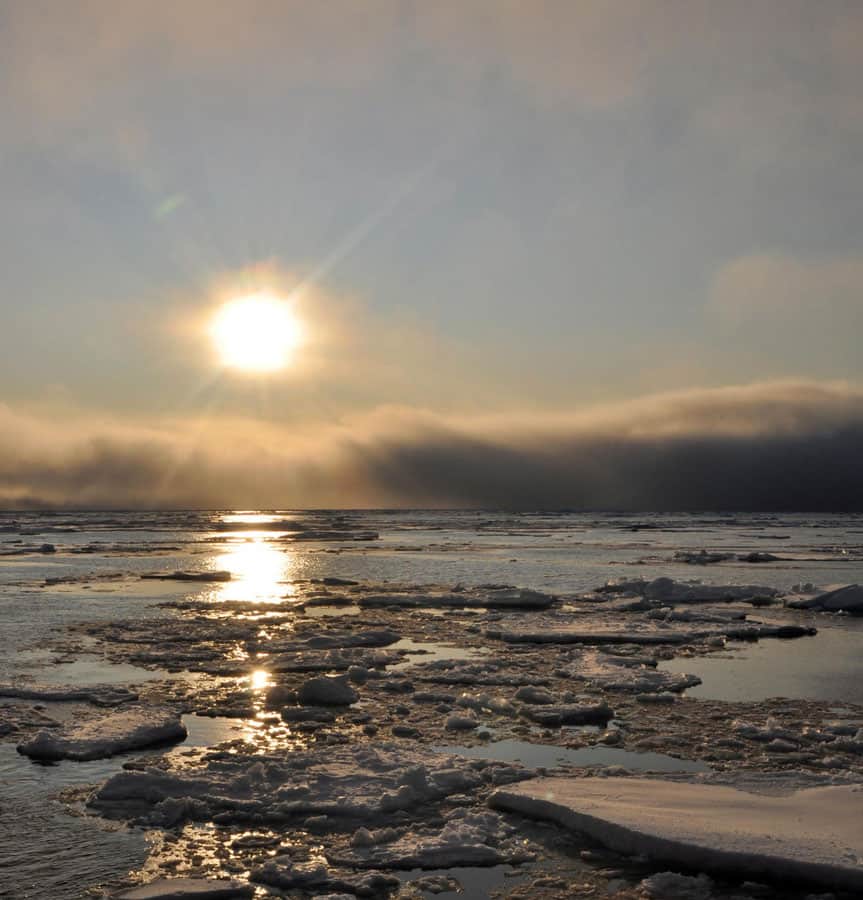 The sun hovers just above the Arctic Ocean horizon Sept. 9, 2009. Photo: Patrick Kelley, U.S. Coast Guard. Public domain.