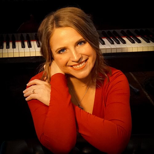 Rachel LaFond at the piano Rachel LaFond Headshot
