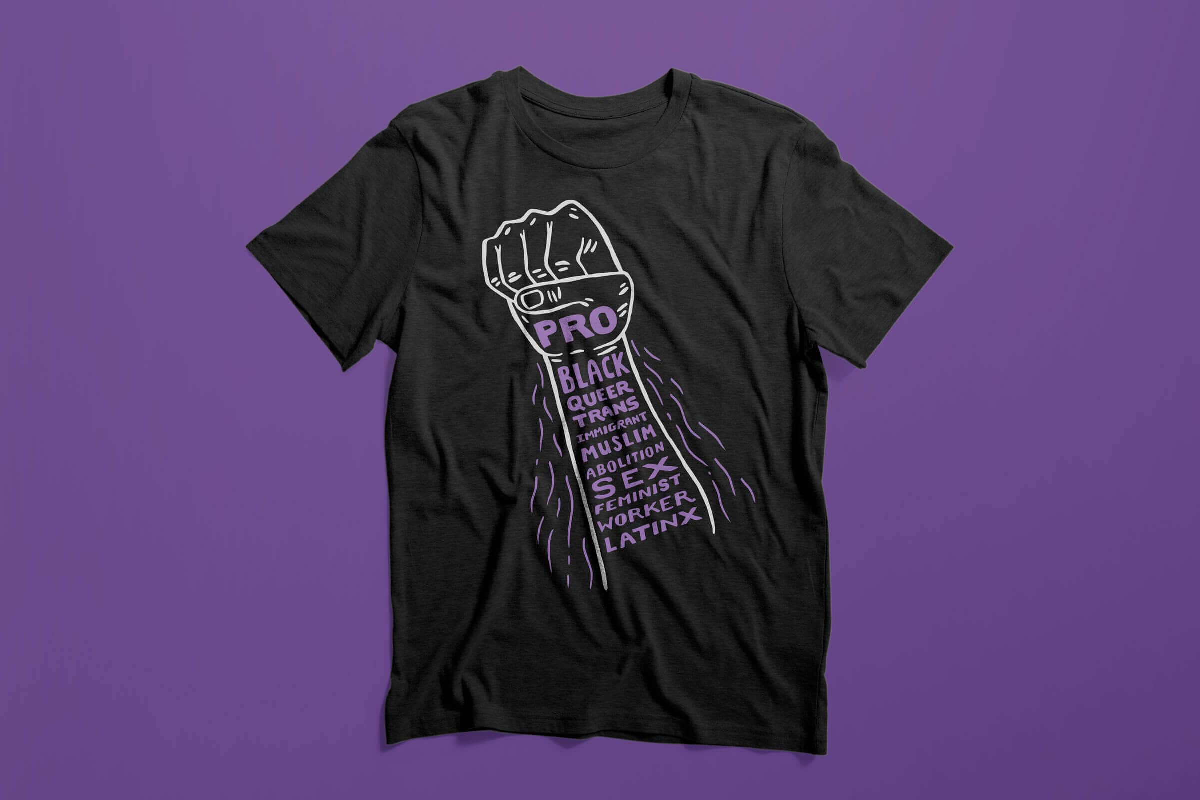 Charcoal heather gray T-shirt with an illustrated line drawing of a fist. The fist and arm contain hand drawn stacked purple type that reads 