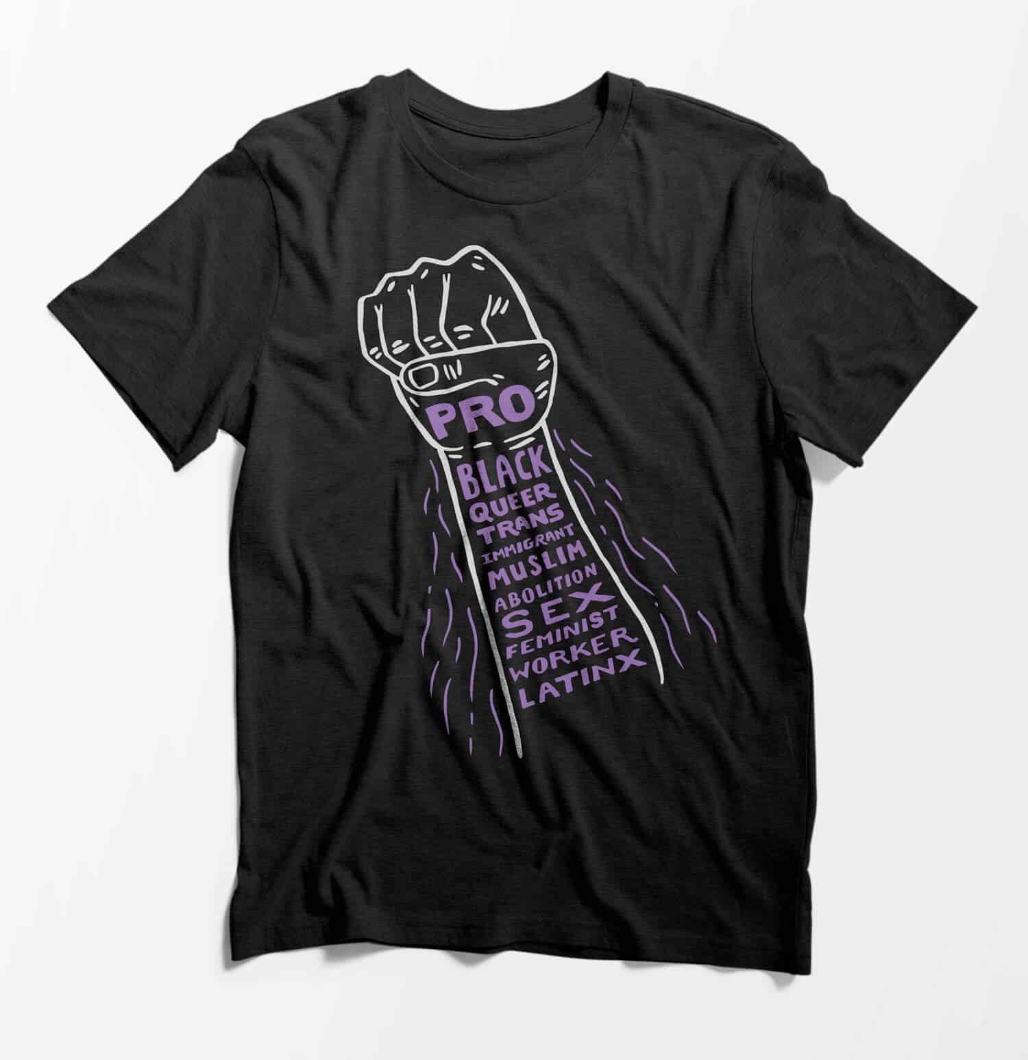 Charcoal heather gray T-shirt with an illustrated line drawing of a fist. The fist and arm contain hand drawn stacked purple type that reads 