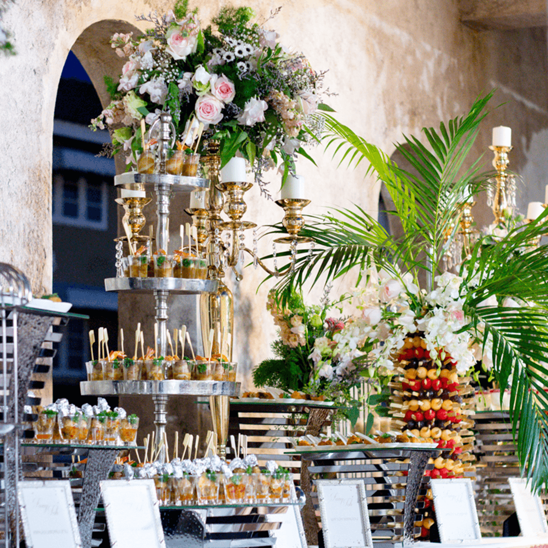 Beautiful Thai event catering with floral arrangements and decor.