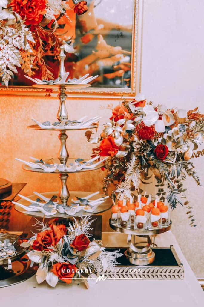 Elegant floral dessert display for special events in Thailand by Mongkol Catering.
