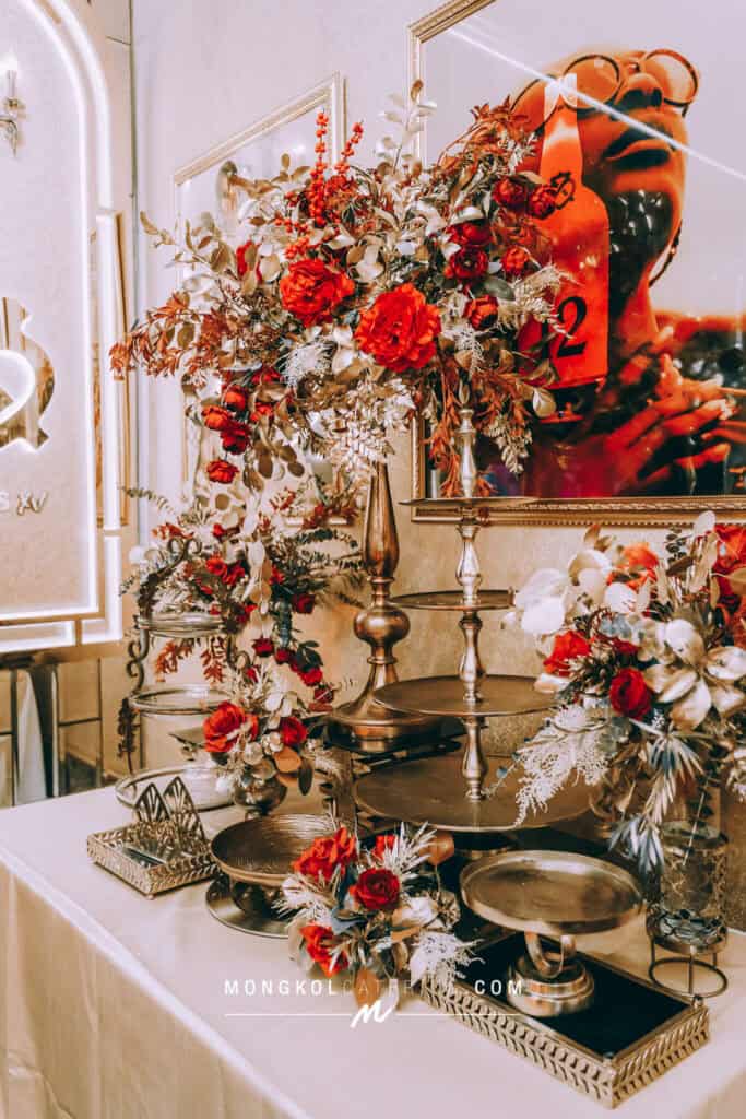 Elegant floral and dessert display for wedding catering in Thailand by Mongkol Catering.