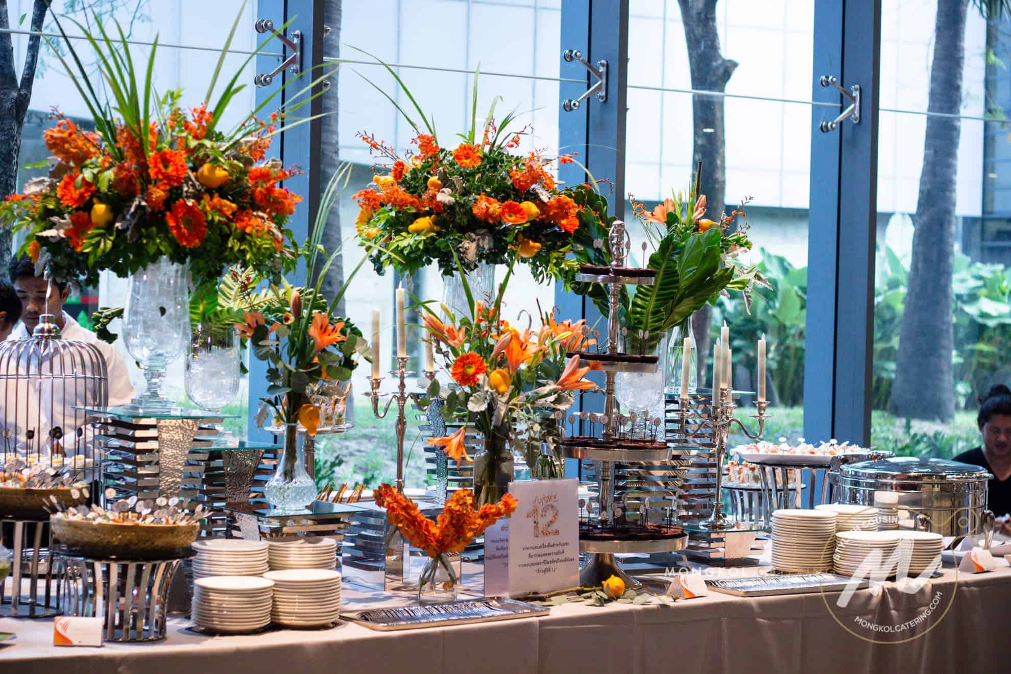 Colorful floral centerpiece for event decorations at Mongkol Catering in Thailand.