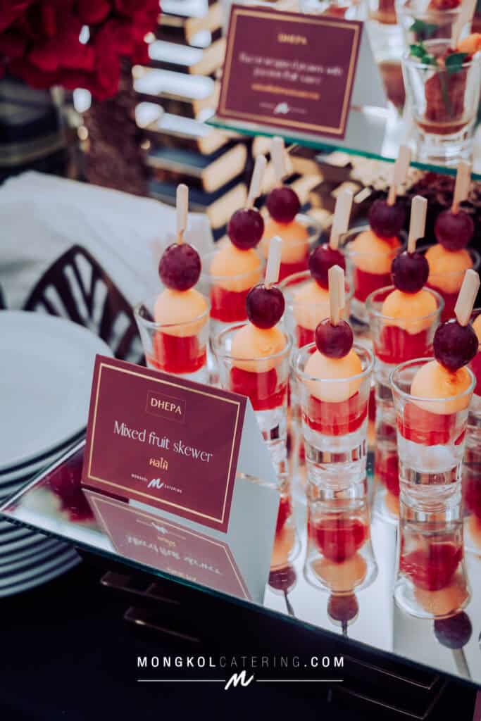 Delicious mixed fruit skewers served at a catering event in Thailand.
