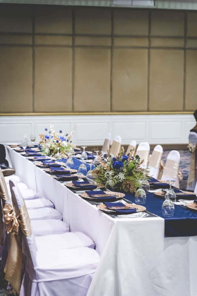 Elegant banquet table setup with floral centerpieces in Thailand, perfect for events and catering.