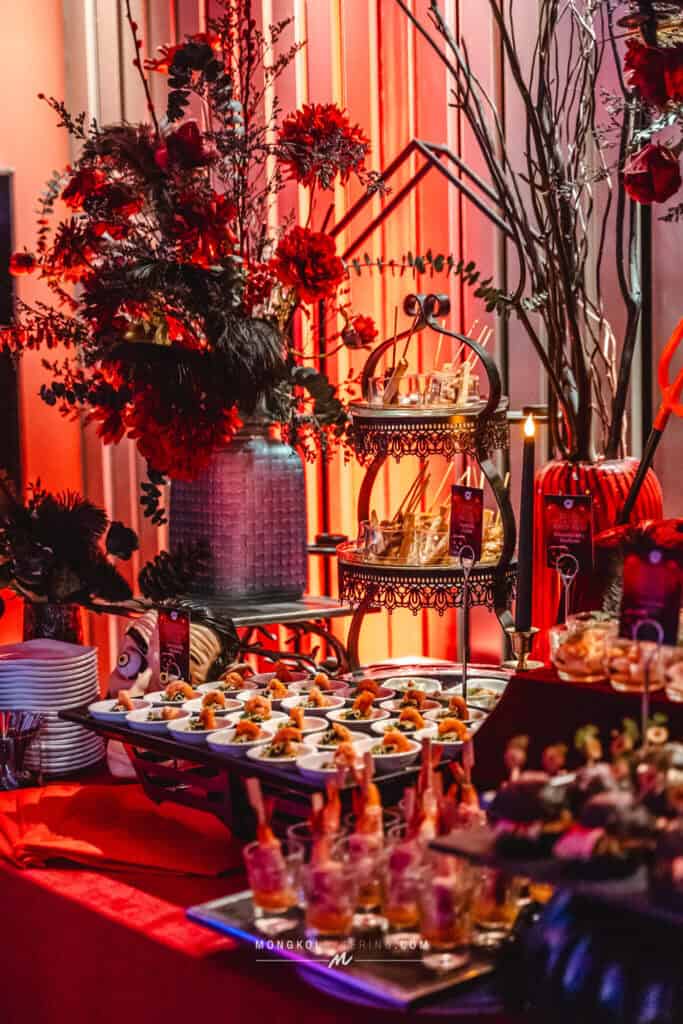 Elegant event catering display with floral decorations in Thailand for special occasions.