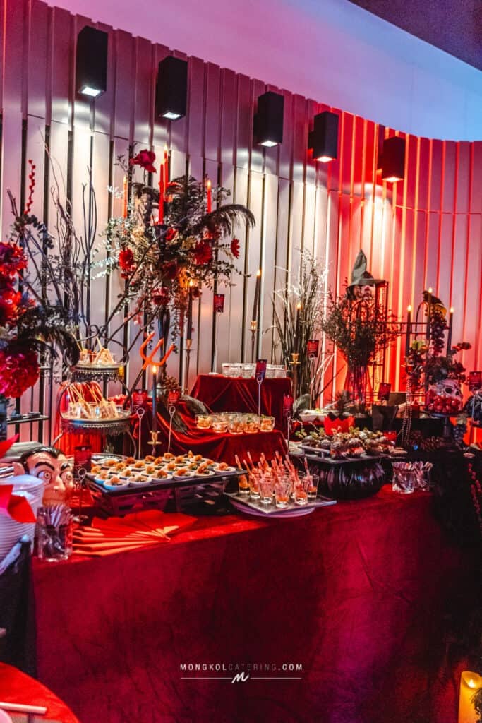 Colorful event catering setup with Halloween-themed decorations in Thailand.