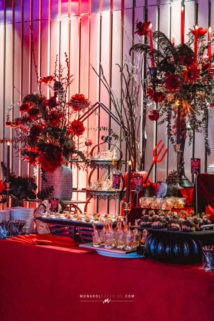 Luxurious event display with floral arrangements and candles at Mongkol Catering, Thailand.