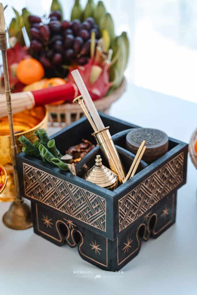 Elegant traditional Thai spice box for event catering, decorated with intricate patterns.