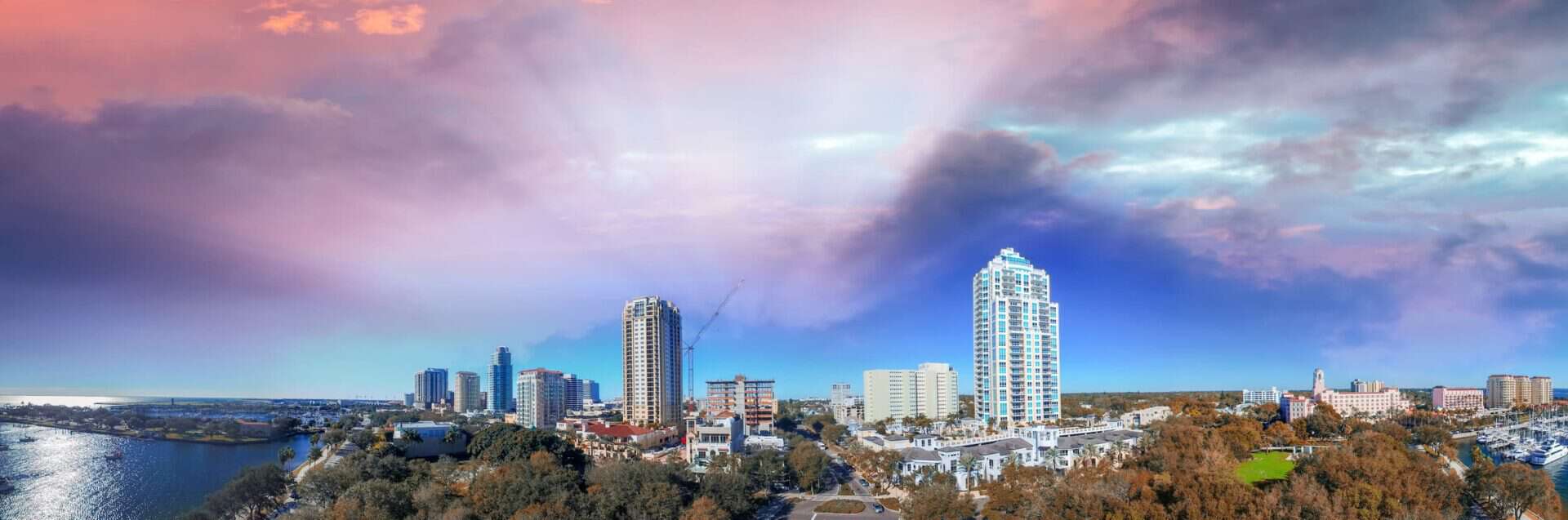 A panoramic view of Tampa Bay at sunset, representing the community served by Health Without Walls, a nonprofit providing mobile medical care for individuals experiencing homelessness.