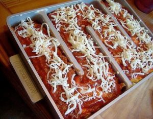 lasagna in pan ready to be baked