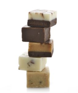 different fudges stacked with white background