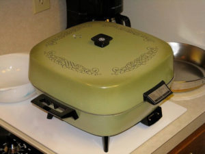 This is an electric skillet, true. But if yours looks like this, it's time to move on.