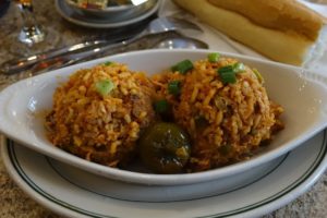 jambalaya served elegantly in white casserole dish