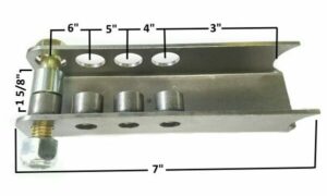 Elongated coil over mount with adjustable positions for vehicle suspension.