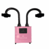 A pink "Whisper" Nail Salon source capture system features two black flexible hoses for dual station use, each ending in a square funnel. The front panel has control buttons, a digital screen, and the device sits on small wheels. Read more at Aerovex Systems (aerovexsystems.com)