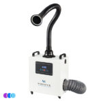 A portable white Whisper MiniVent air filtration and nail dust capture unit with a flexible black hose extending upward and outward, ending in a wide circular nozzle with LED light. The front panel displays controls and the brand "WHISPER." A gray vent hose connects to the lower right side. The unit is on wheels. Read more at Aerovex Systems (aerovexsystems.com)
