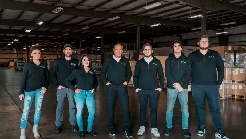group photo in warehouse