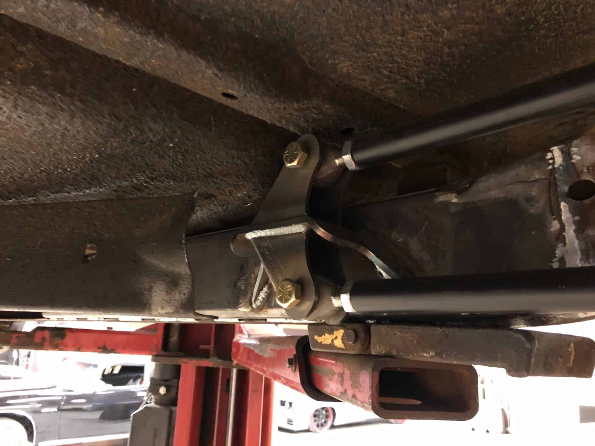 Heavy-duty suspension upgrade installed on vehicle chassis for improved handling and stability.